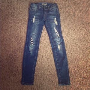 Blue skinny ripped jeans